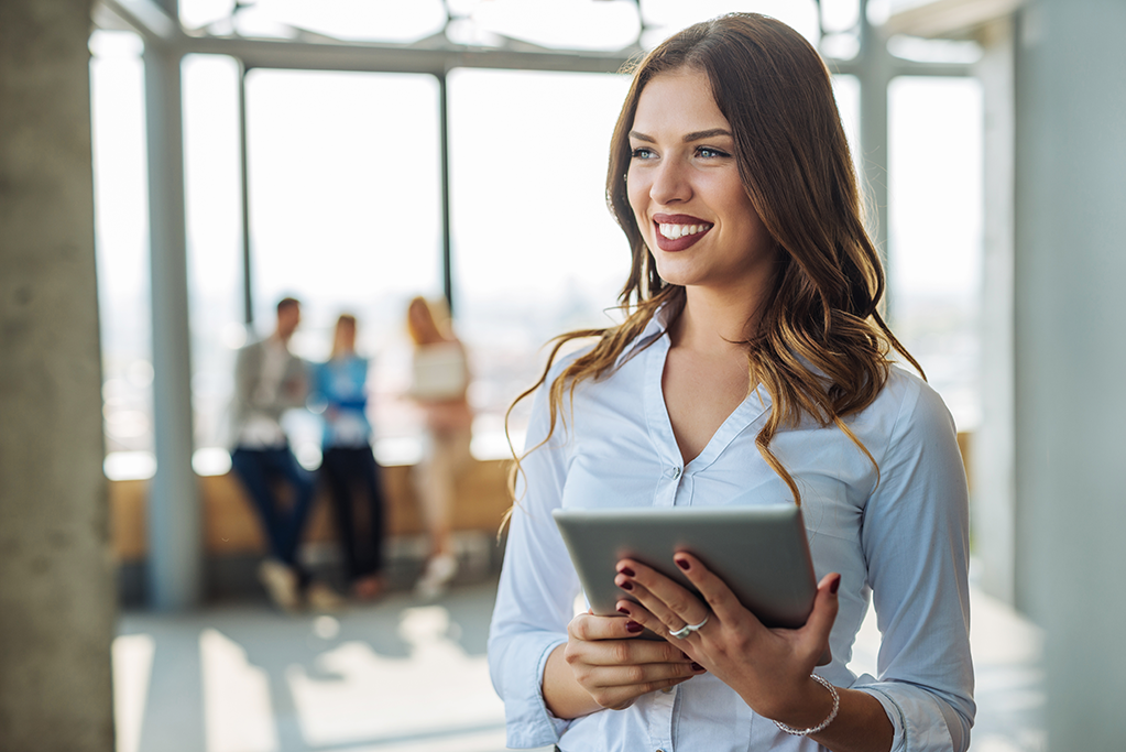 Business women holding ipad 